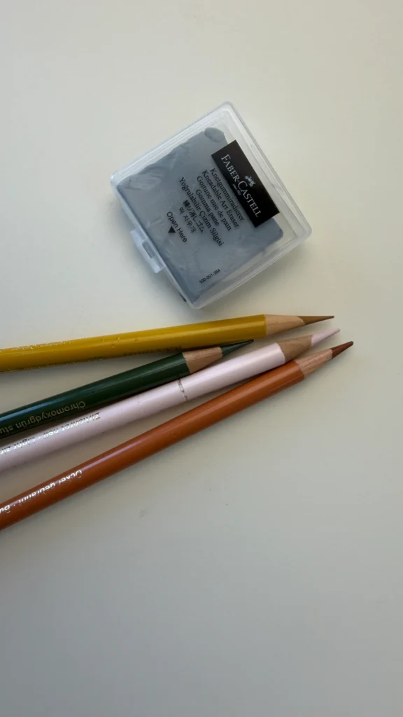 My favourite eraser for coloured pencil is the Faber-Castell Kneadable Eraser.